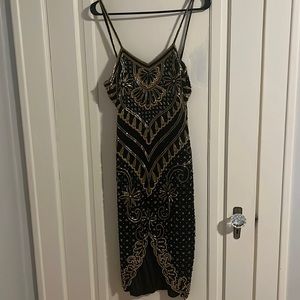 Elegant Black and Gold Embellished Dress